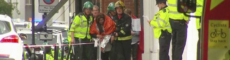 London: In this image made from video, a woman with blankets wrapped around her is being escorted by emergency services near the scene of an explosion in London Friday, Sept. 15, 2017. A reported explosion at a train station sent commuters stampeding in panic, injuring several people at the height of London's morning rush hour, and police said they were investigating it as a terrorist attack. AP/PTI(AP9_15_2017_000140A)